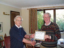 Rod Lovett accepting his award from Colin Barnes